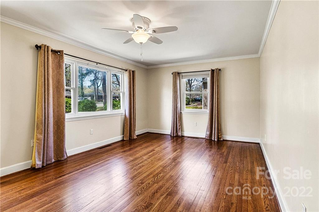 422 Fieldstone Road Mooresville, NC 28115 - Photo 9 of 36 wooden floor in an empty room with a window