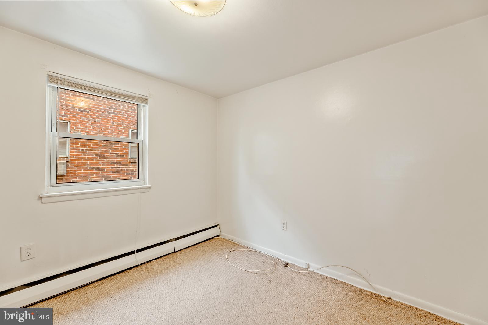 4311 Pearson Avenue Philadelphia, PA 19114 - Photo 13 of 41 an empty room with a window