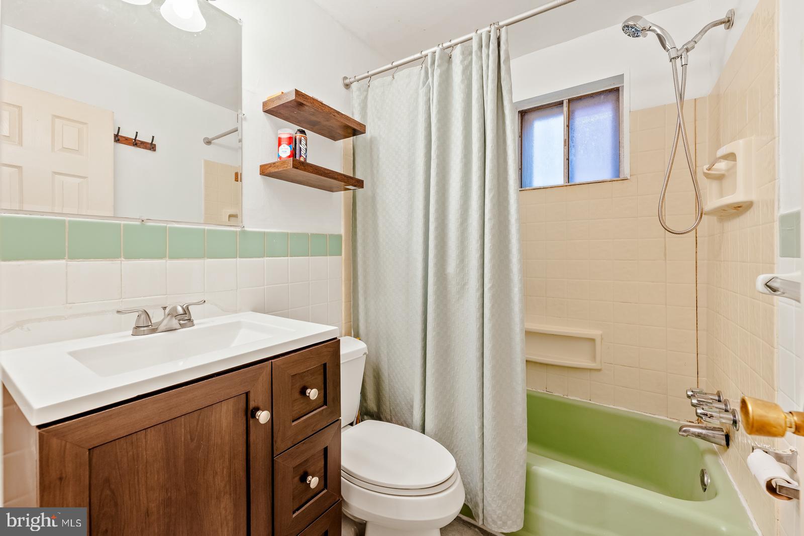 4311 Pearson Avenue Philadelphia, PA 19114 - Photo 14 of 41 a bathroom with a sink a toilet and a bathtub