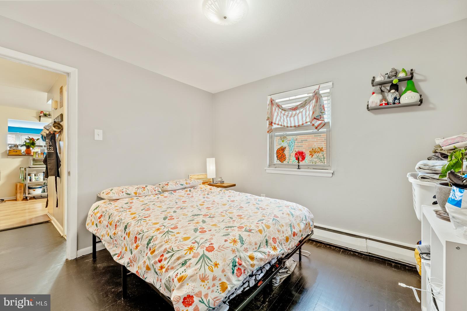 4311 Pearson Avenue Philadelphia, PA 19114 - Photo 28 of 41 a bedroom with a bed and a painting on the wall