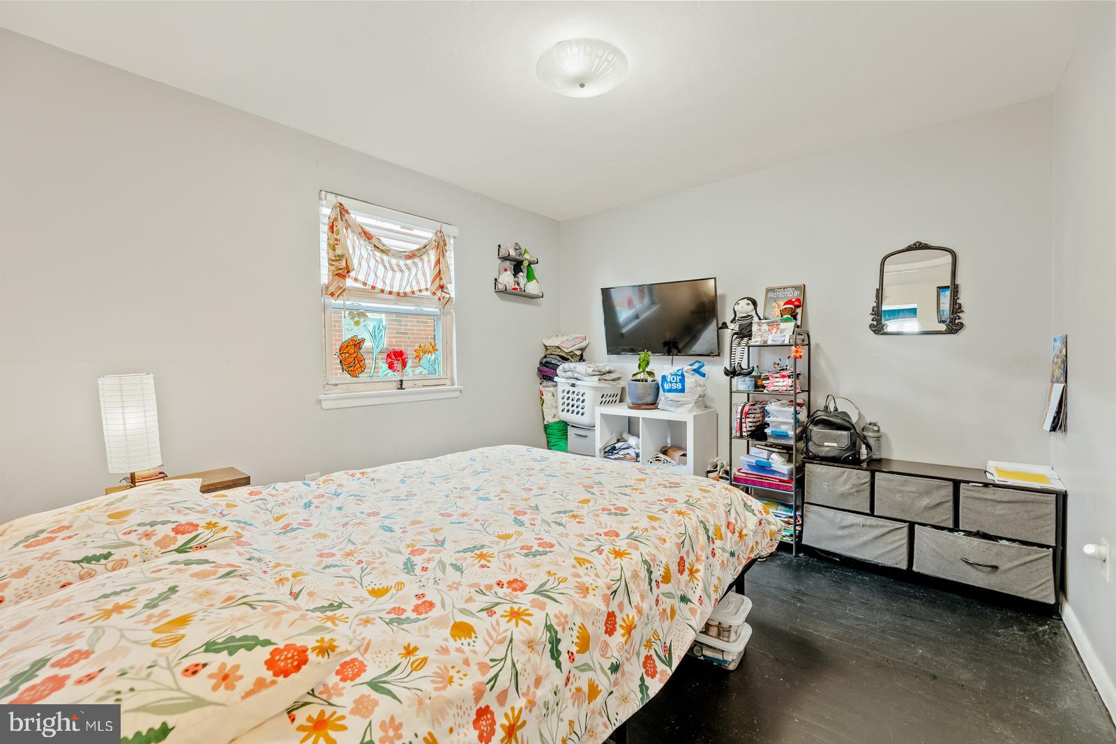 4311 Pearson Avenue Philadelphia, PA 19114 - Photo 29 of 41 a bedroom that has a bed and a tv in it