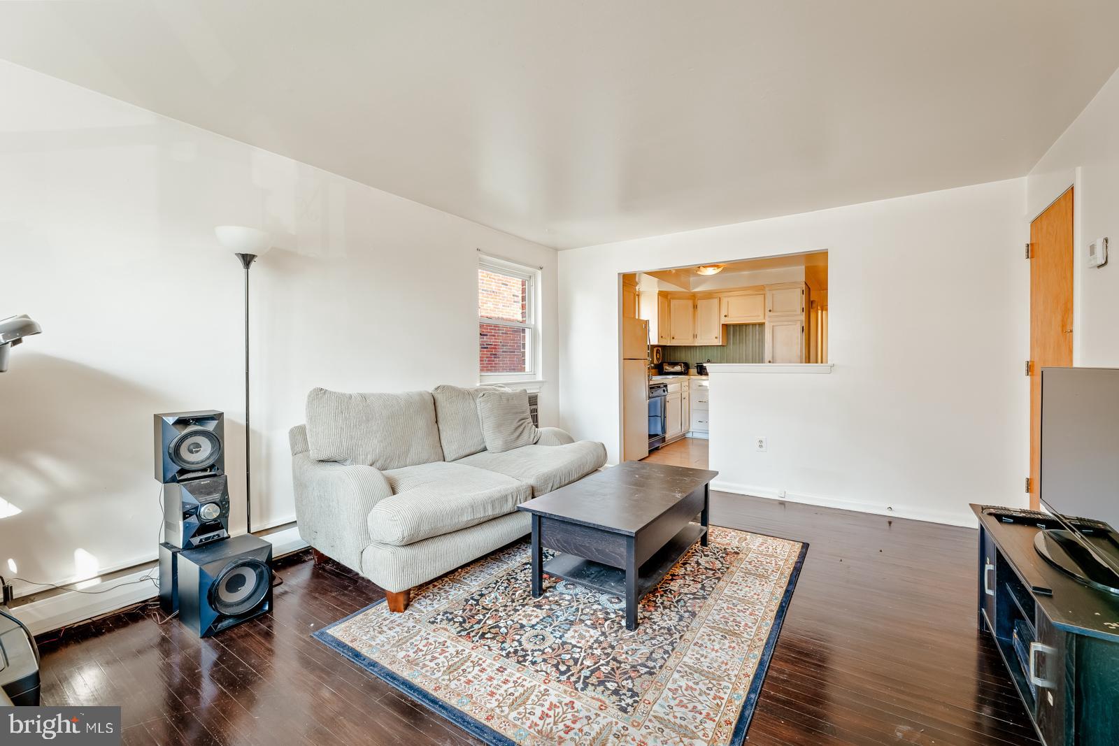 4311 Pearson Avenue Philadelphia, PA 19114 - Photo 4 of 41 a living room with furniture and a flat screen tv
