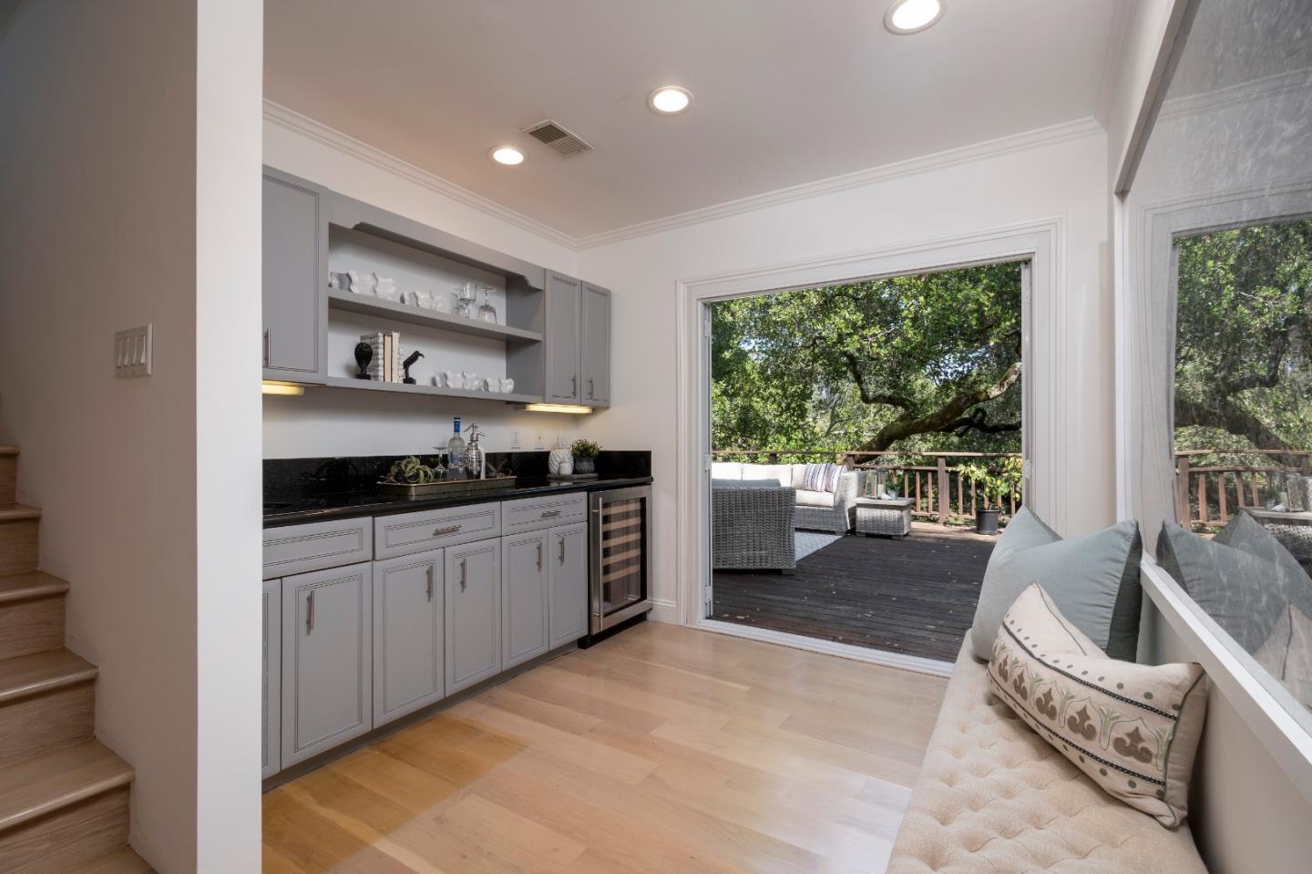 775 Bowhill Road Hillsborough, CA 94010 - Photo 13 of 28 a kitchen with stainless steel appliances granite countertop a stove a sink and a refrigerator