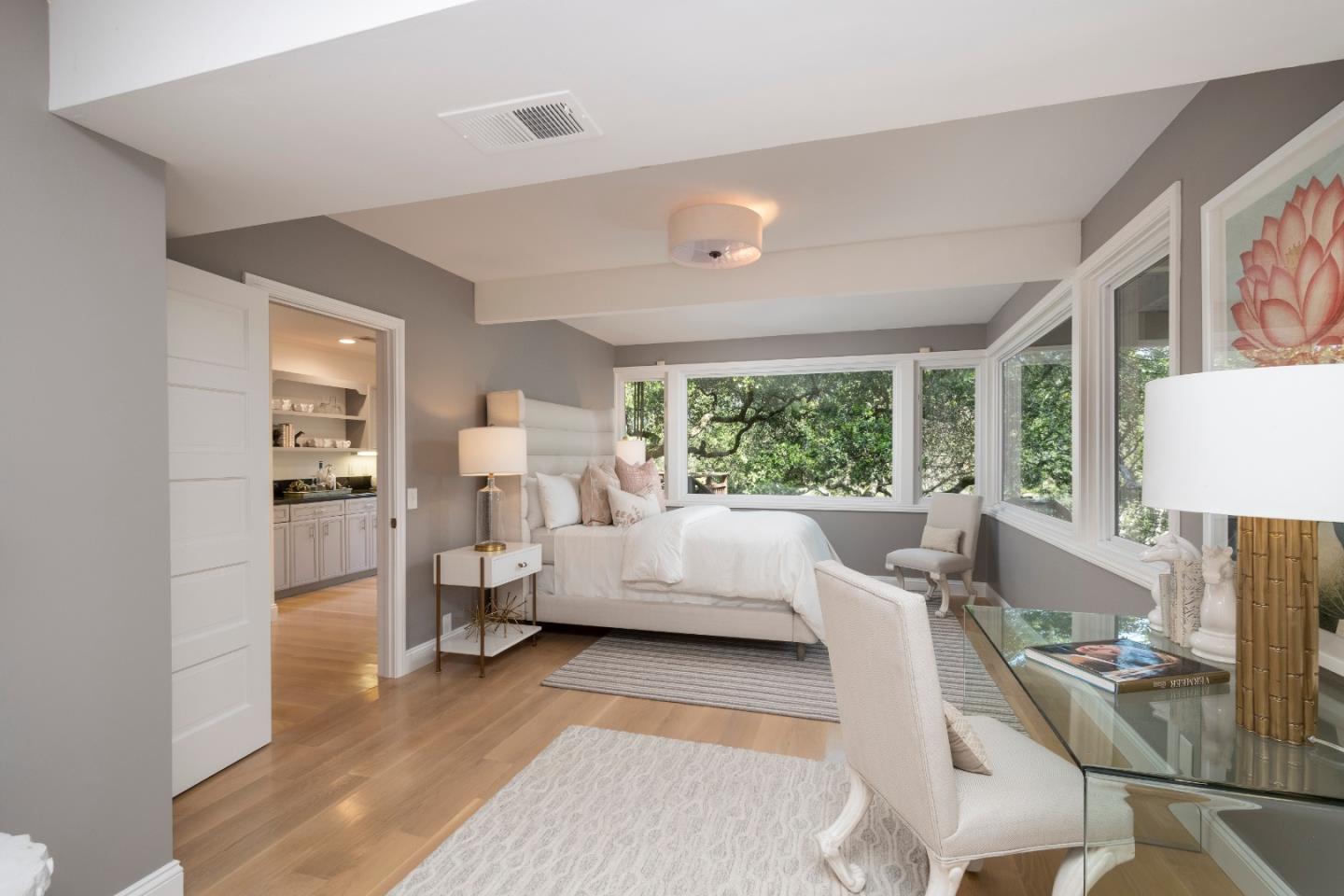 775 Bowhill Road Hillsborough, CA 94010 - Photo 14 of 28 a living room with furniture and a large window