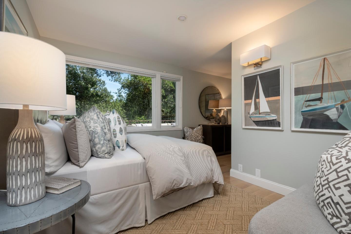 775 Bowhill Road Hillsborough, CA 94010 - Photo 17 of 28 a bedroom with a bed and wooden floor