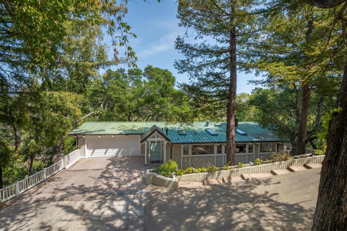 775 Bowhill Road Hillsborough, CA 94010 - Photo 2 of 28 a view of a back yard of the house