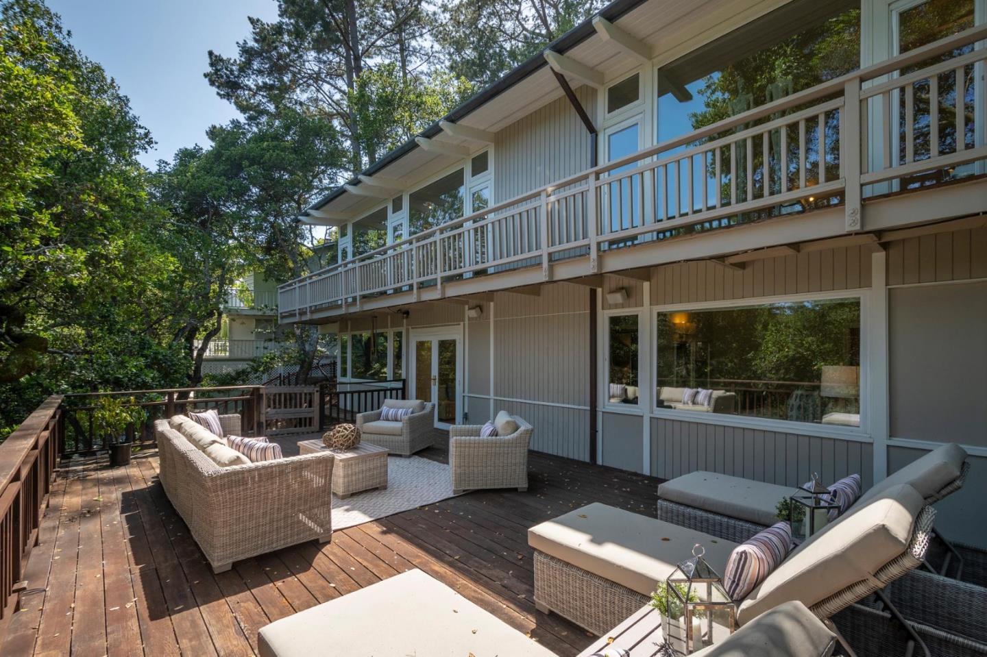 775 Bowhill Road Hillsborough, CA 94010 - Photo 28 of 28 a view of a patio with couches table and chairs and potted plants