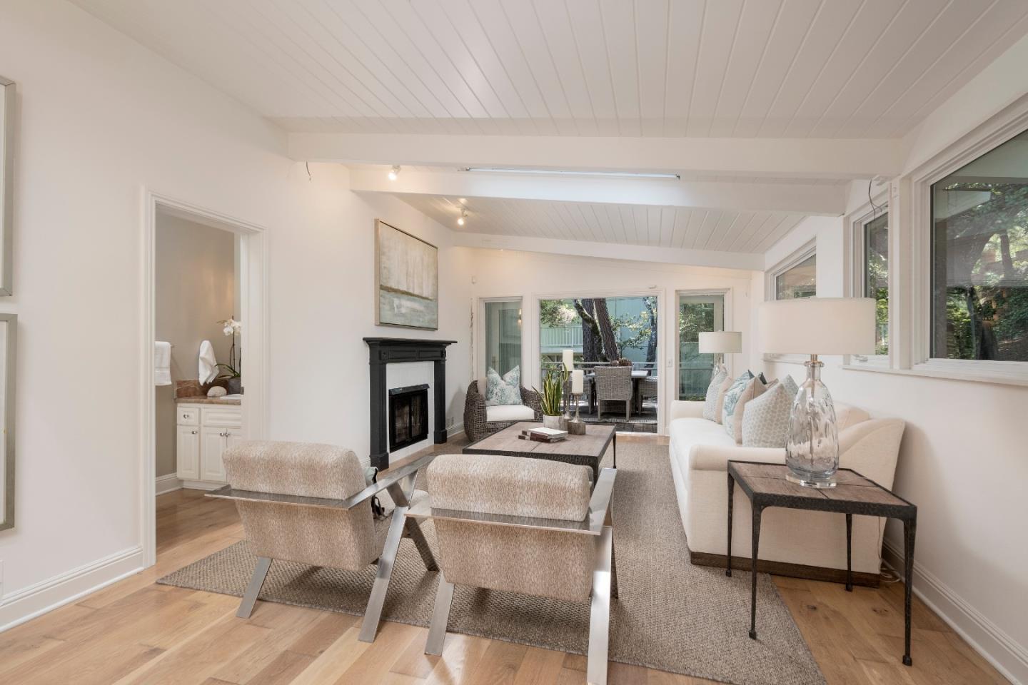 775 Bowhill Road Hillsborough, CA 94010 - Photo 5 of 28 a living room with fireplace furniture and a fireplace