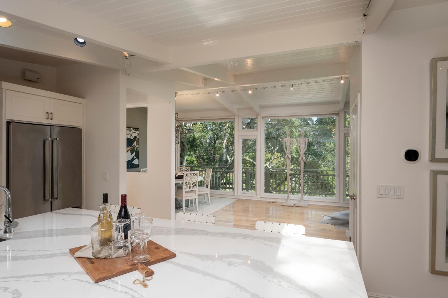 775 Bowhill Road Hillsborough, CA 94010 - Photo 7 of 28 a living room with furniture and a large window