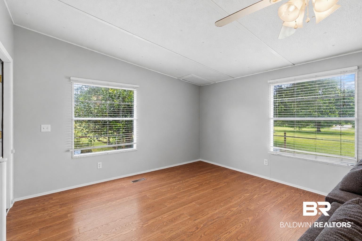 26788 Feely Road Elberta, AL 36530 - Photo 8 of 31 Interior space featuring neutral gray walls and wood-finish flooring