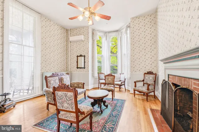 a kitchen with stainless steel appliances granite countertop a stove refrigerator sink and cabinets
