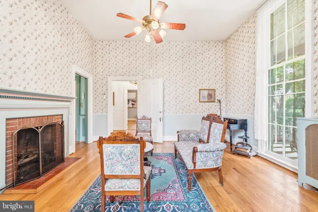 a kitchen with stainless steel appliances granite countertop a stove a sink a refrigerator and a cabinets