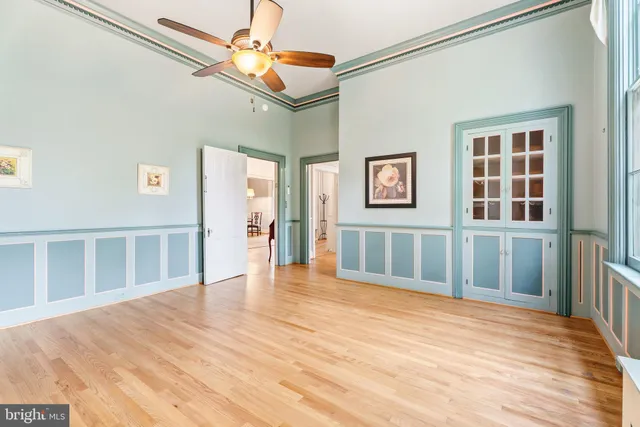 a bathroom with a sink a toilet and a shower curtain
