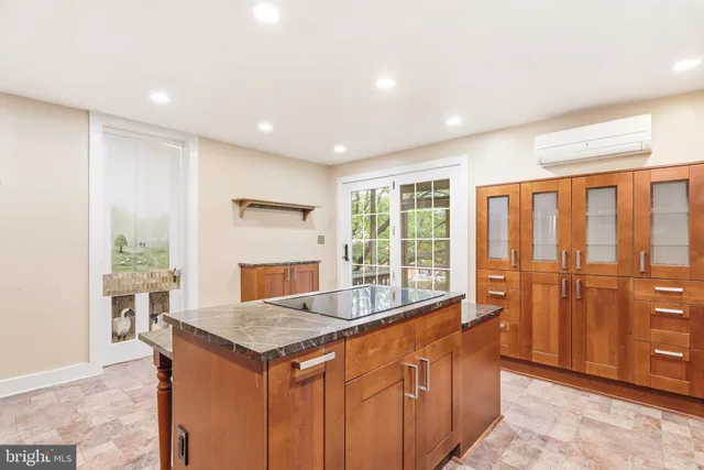 a view of a balcony with chairs