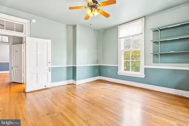 an aerial view of residential house with outdoor space