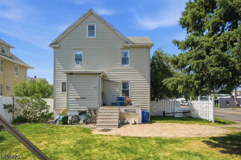 33 Pulaski Place Hackensack, NJ 07601 - Photo 29 of 31 a front view of a house with garage