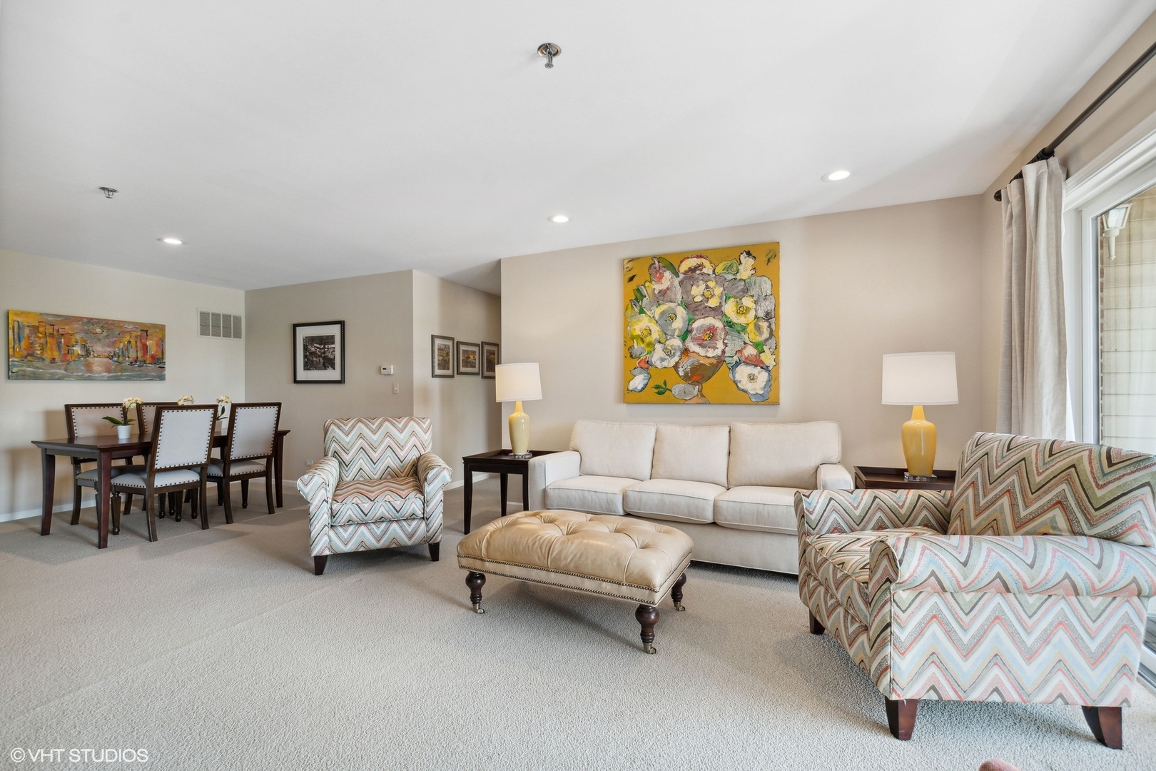 308 North Happ Road, Unit 310 Northfield, IL 60093 - Photo 2 of 17 a living room with furniture and a large window