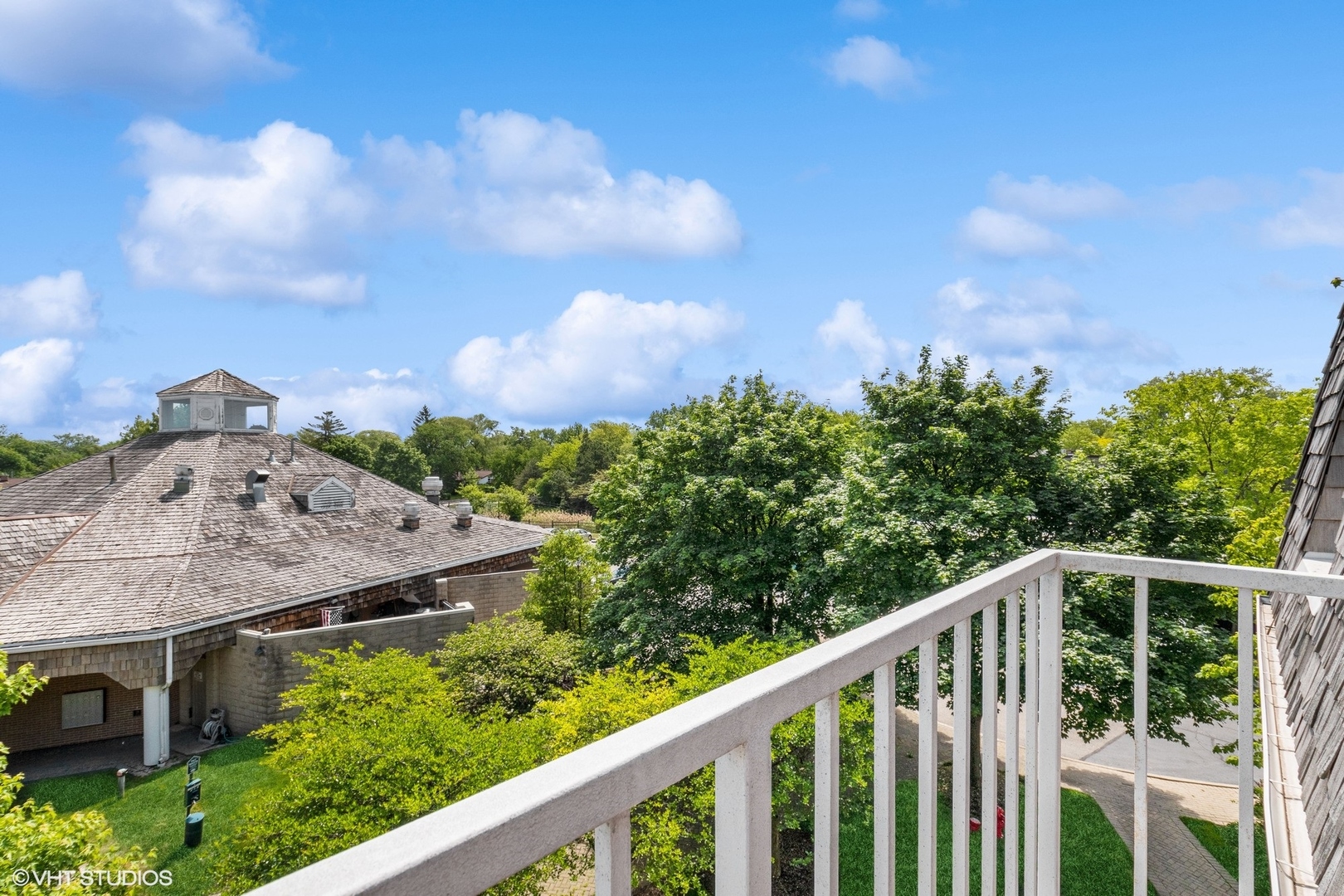 308 North Happ Road, Unit 310 Northfield, IL 60093 - Photo 9 of 17 a view of a balcony with an outdoor space