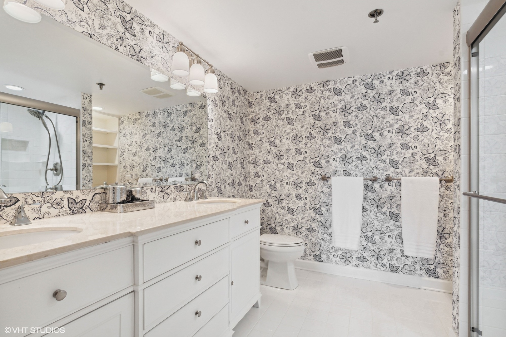 308 North Happ Road, Unit 310 Northfield, IL 60093 - Photo 10 of 17 a bathroom with a sink toilet and shower