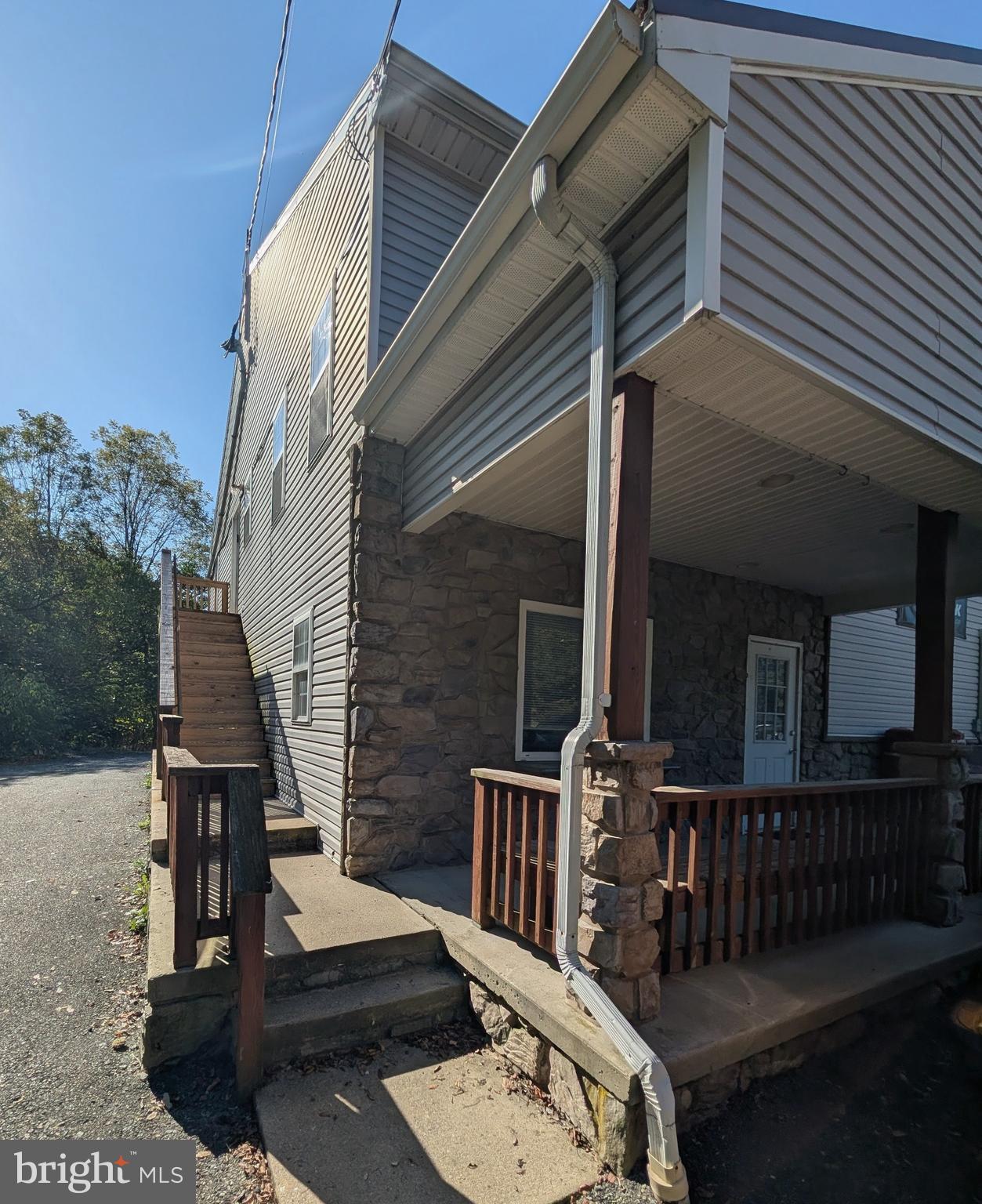383 Nottingham Road Quarryville, PA 17566 - Photo 2 of 10 a view of balcony with wooden floor and fence