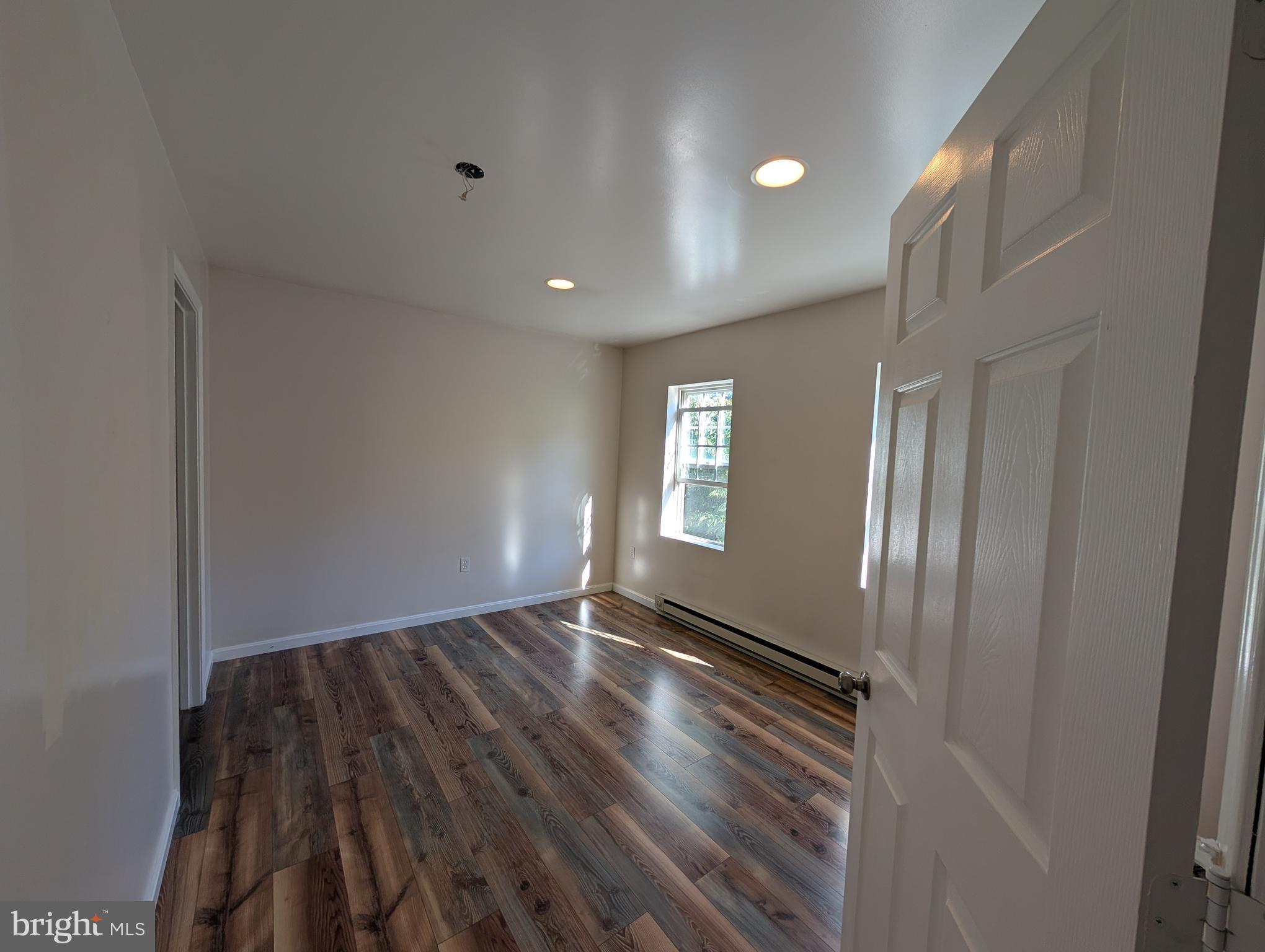 383 Nottingham Road Quarryville, PA 17566 - Photo 6 of 10 a view of an empty room and window