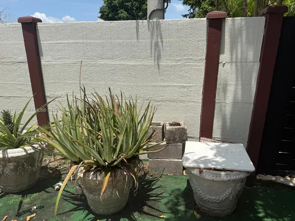 a vase of flowers sitting on a table