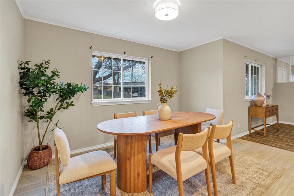 1009 Russell Road Everman, TX 76140 - Photo 9 of 20 a view of a dining room with furniture and window