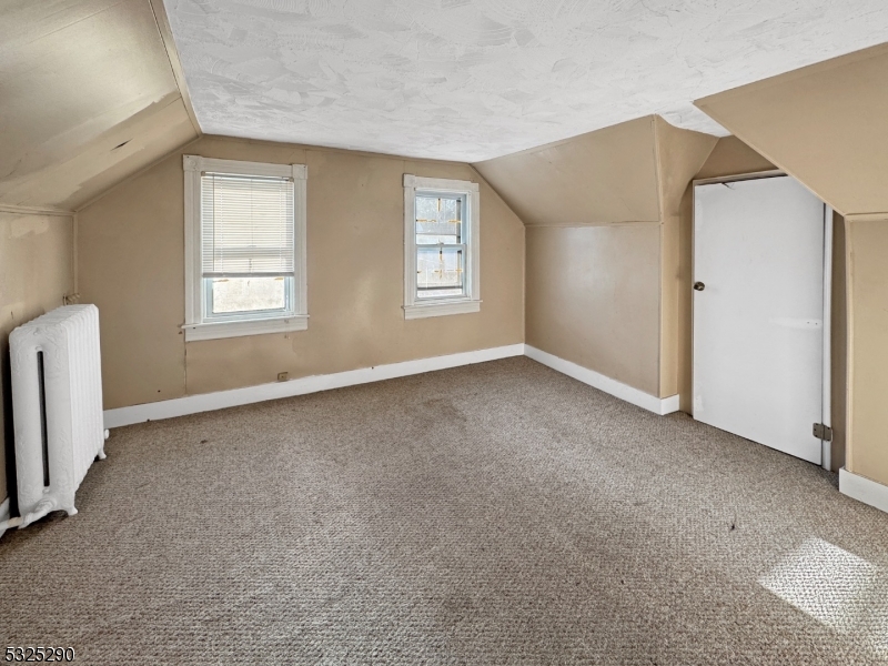 62 Summit Avenue, Unit B Phillipsburg, NJ 08865 - Photo 5 of 9 an empty room with windows