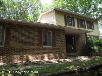 30 Holly Forest Road Mount Pocono, PA 18344 - Photo 1 of 12 a view of house with backyard