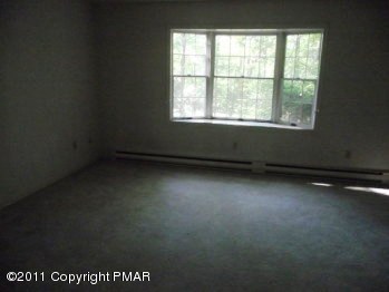30 Holly Forest Road Mount Pocono, PA 18344 - Photo 11 of 12 an empty room with a window