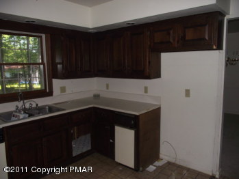 30 Holly Forest Road Mount Pocono, PA 18344 - Photo 3 of 12 a kitchen with a sink and a window