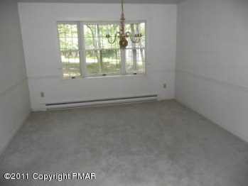 30 Holly Forest Road Mount Pocono, PA 18344 - Photo 4 of 12 an empty room with a window