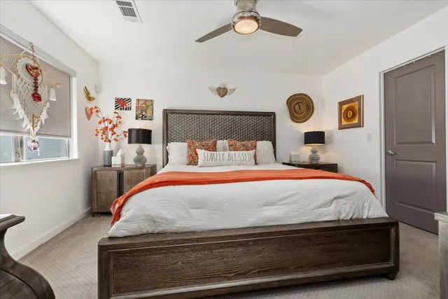 a living room with furniture a rug and a fireplace