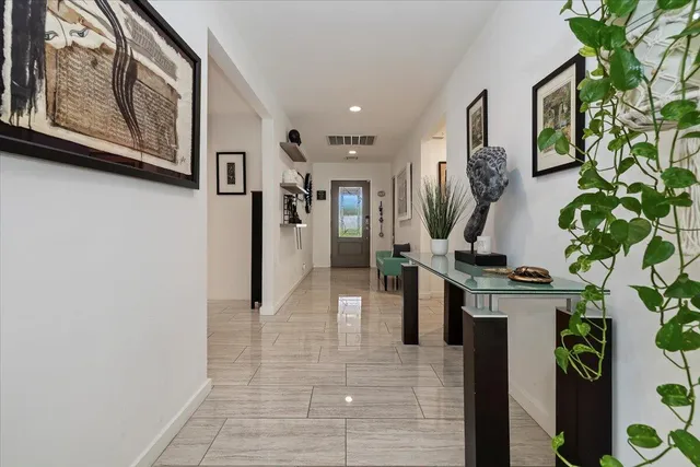 a view of a hallway with workspace