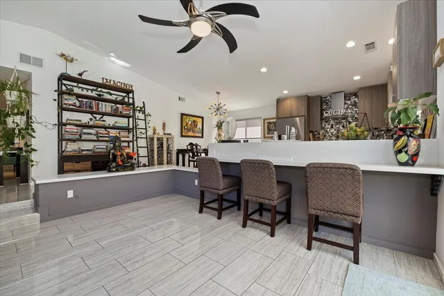 a living room with furniture and window