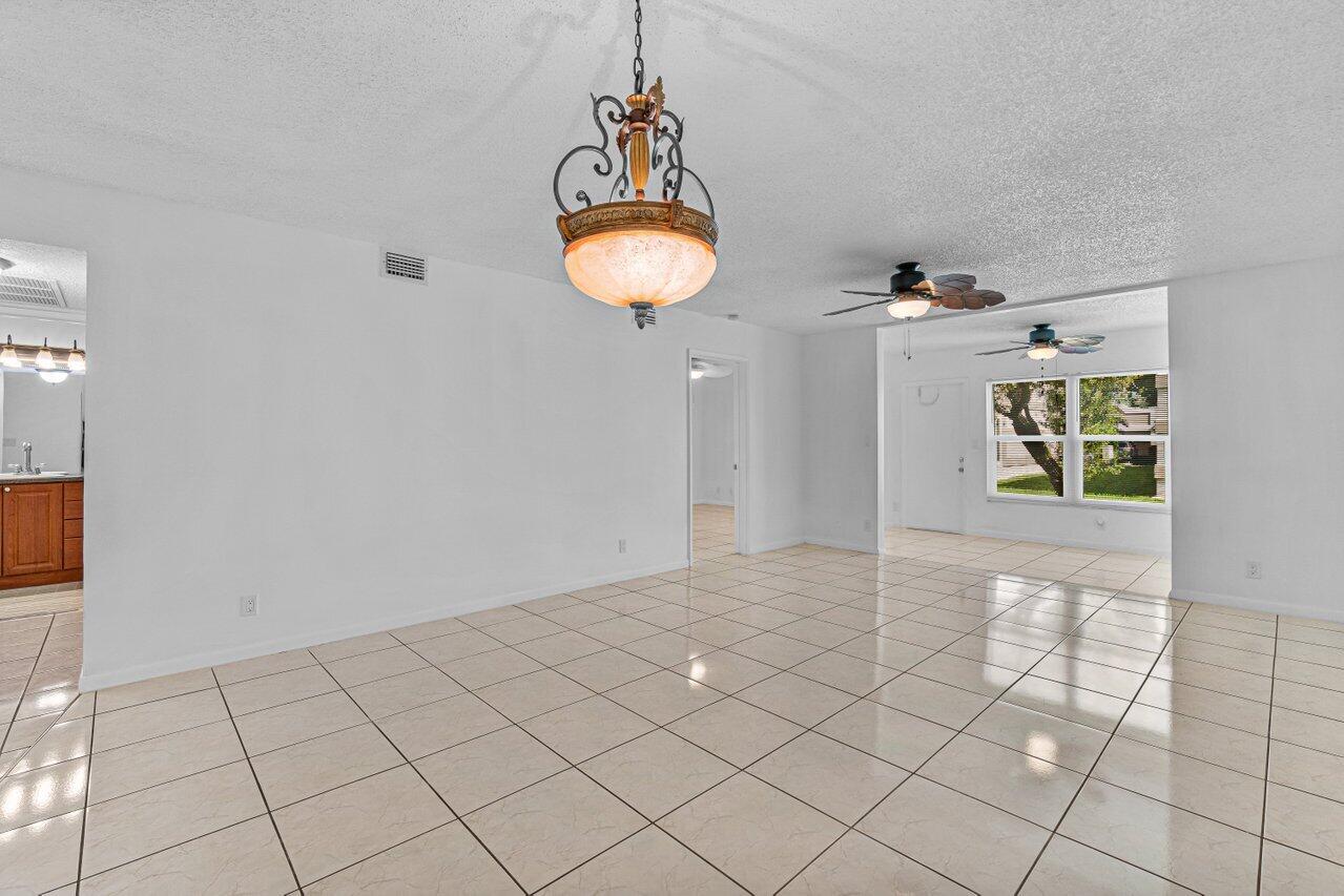 18800 Jolson Avenue, Unit 2 Boca Raton, FL 33496 - Photo 8 of 25 Dining/ Living