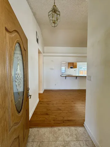 a view of a livingroom with washer and dryer