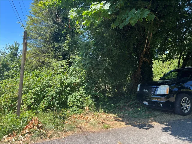 a car parked in front of a house