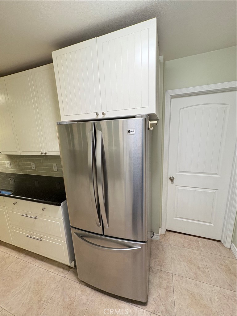 743 Woodland Road Crestline, CA 92325 - Photo 21 of 57 a view of a refrigerator in kitchen