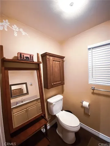 a view of walk in closet with clothes