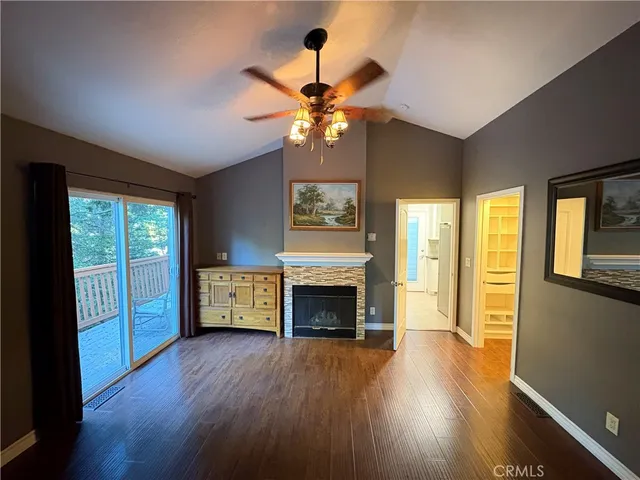 a view of a room with chairs and a table
