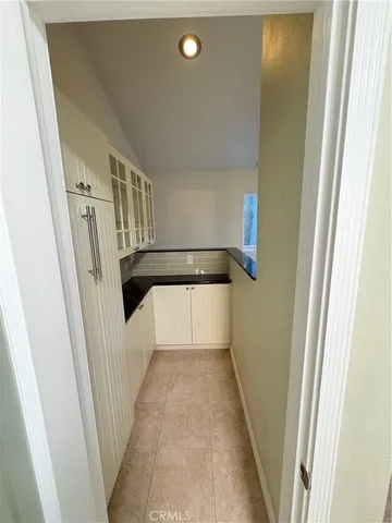 a view of living room with furniture and flat screen tv