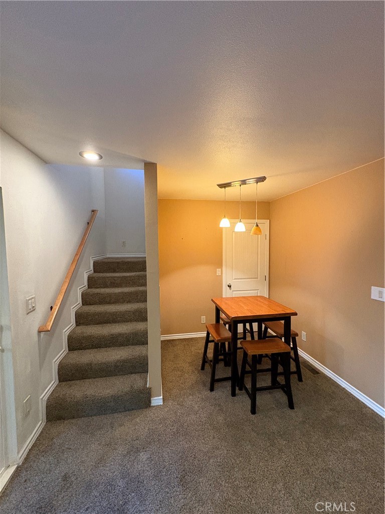743 Woodland Road Crestline, CA 92325 - Photo 47 of 57 a view of a room with chairs and a table