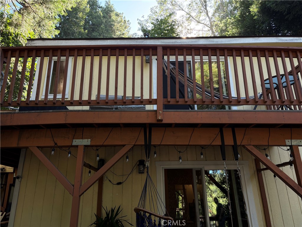 743 Woodland Road Crestline, CA 92325 - Photo 5 of 57 a view of a balcony with furniture