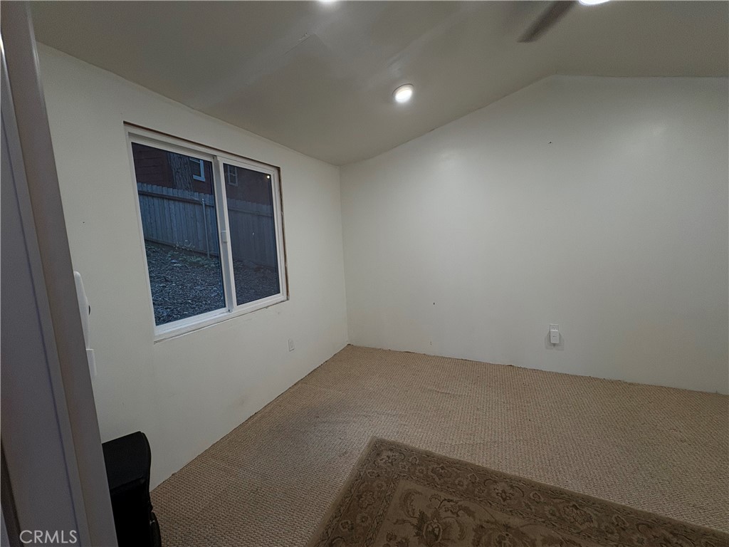 743 Woodland Road Crestline, CA 92325 - Photo 52 of 57 an empty room with windows