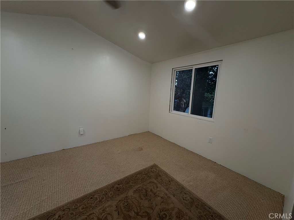 743 Woodland Road Crestline, CA 92325 - Photo 54 of 57 an empty room with a window
