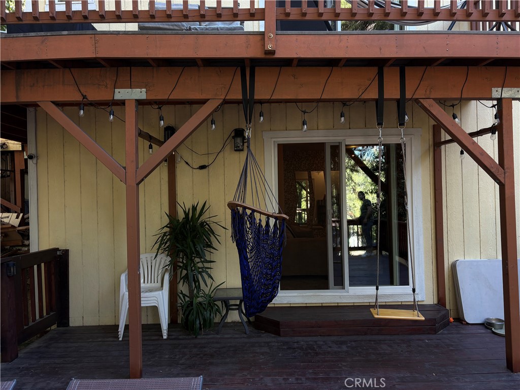 743 Woodland Road Crestline, CA 92325 - Photo 6 of 57 a view of entryway and hall with wooden floor