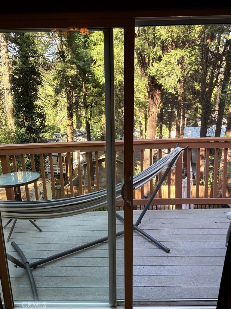 743 Woodland Road Crestline, CA 92325 - Photo 10 of 57 a view of a balcony with trees