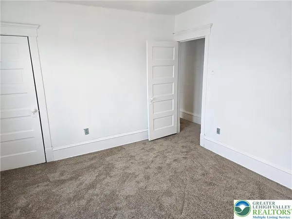 an empty room with closet