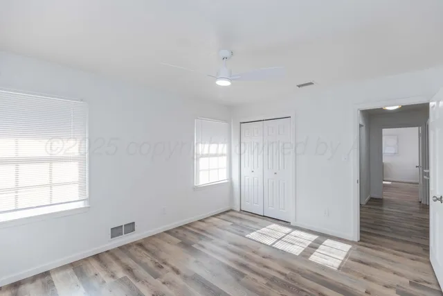 a view of an empty room and window